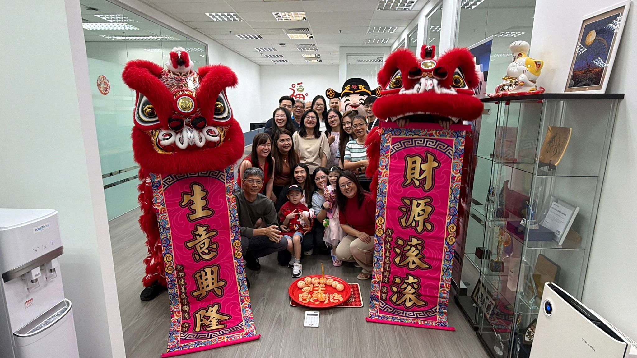 AsiaCloud's published photograph of its team celebrating together at the office